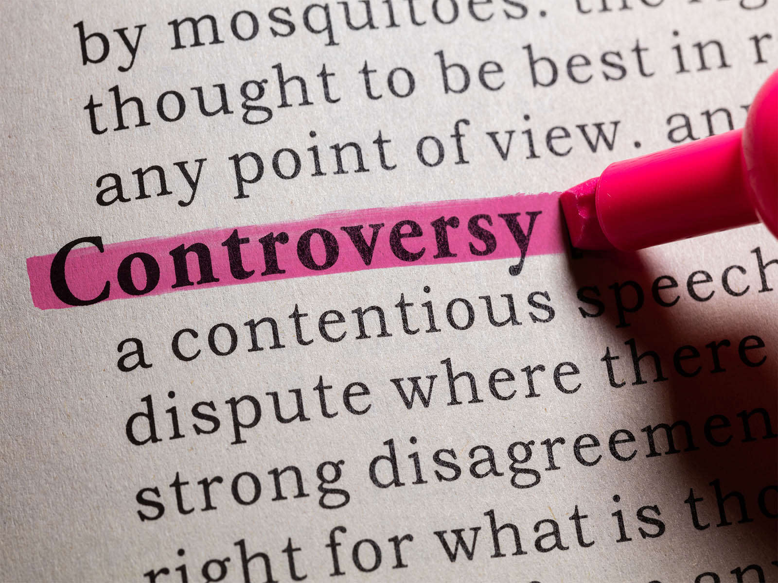 Illustration showing the word "controversy" from a dictionary. Re: AML software, KYC software, AML Compliance